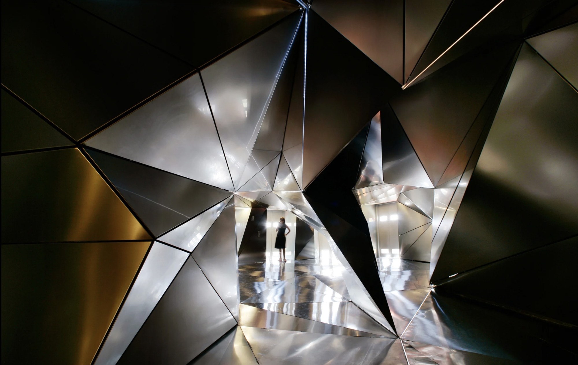 Lobby of the floor designed by Plasma Studio, image courtesy of Hotel Puerta América title=
