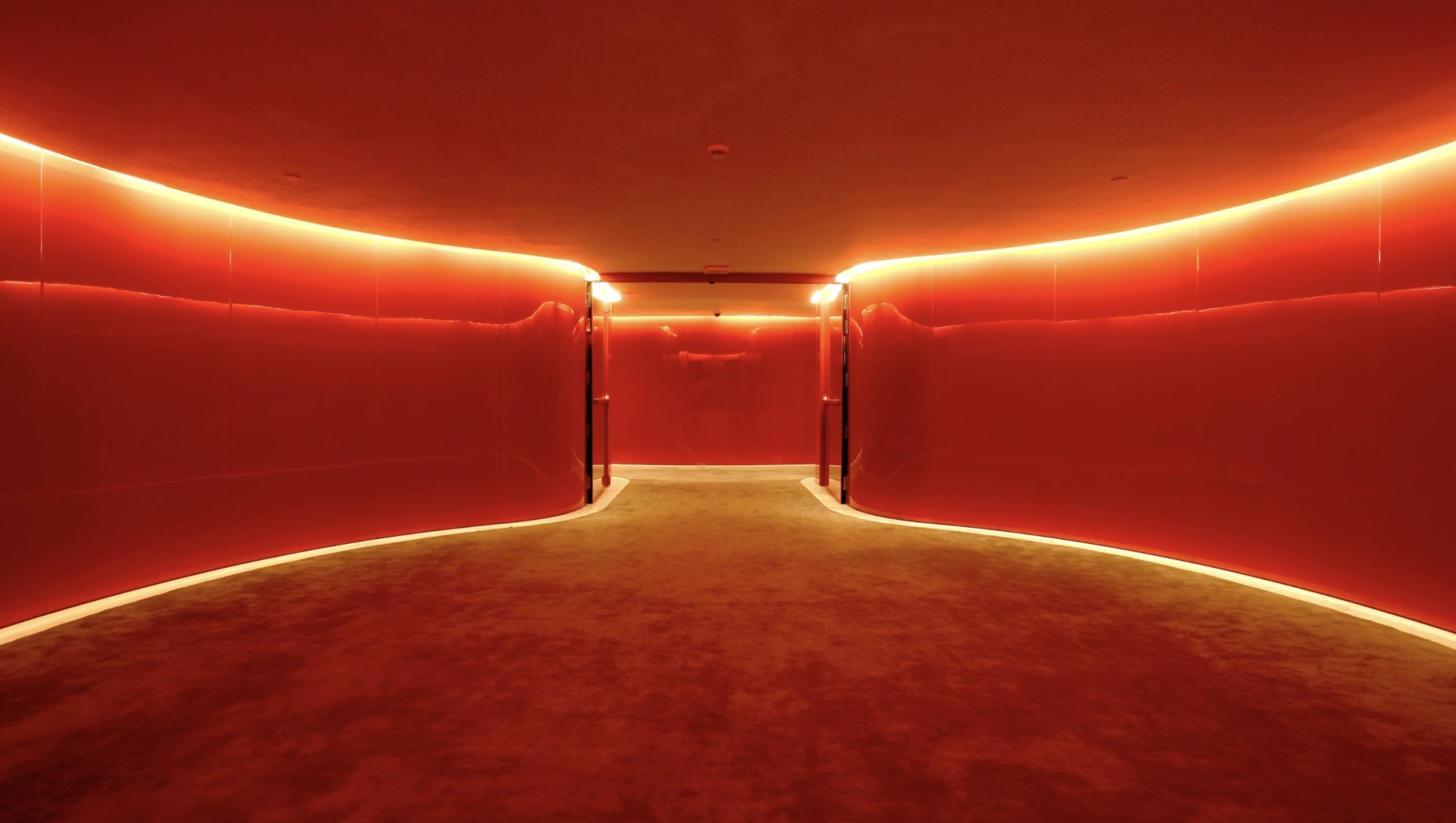 Hallway of the floor designed by Marc Newson, image courtesy of Hotel Puerta América title=